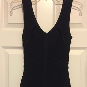 Bebe black nylon and Lycra bandage dress. Size S